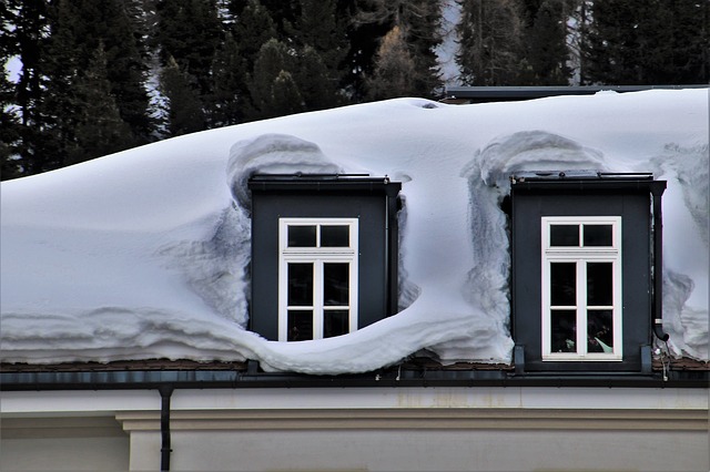 attic insulation near syracuse ny image of roof covered in snow